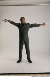 ERIC PILOT STANDING POSE WITH GUNS